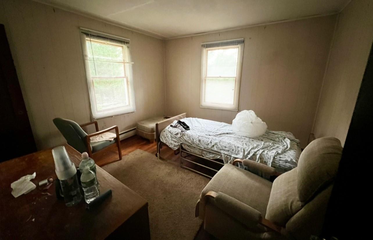 100 Maple Lane Medford, NY 11763 - Photo 10 of 13 Bedroom featuring wood finished floors