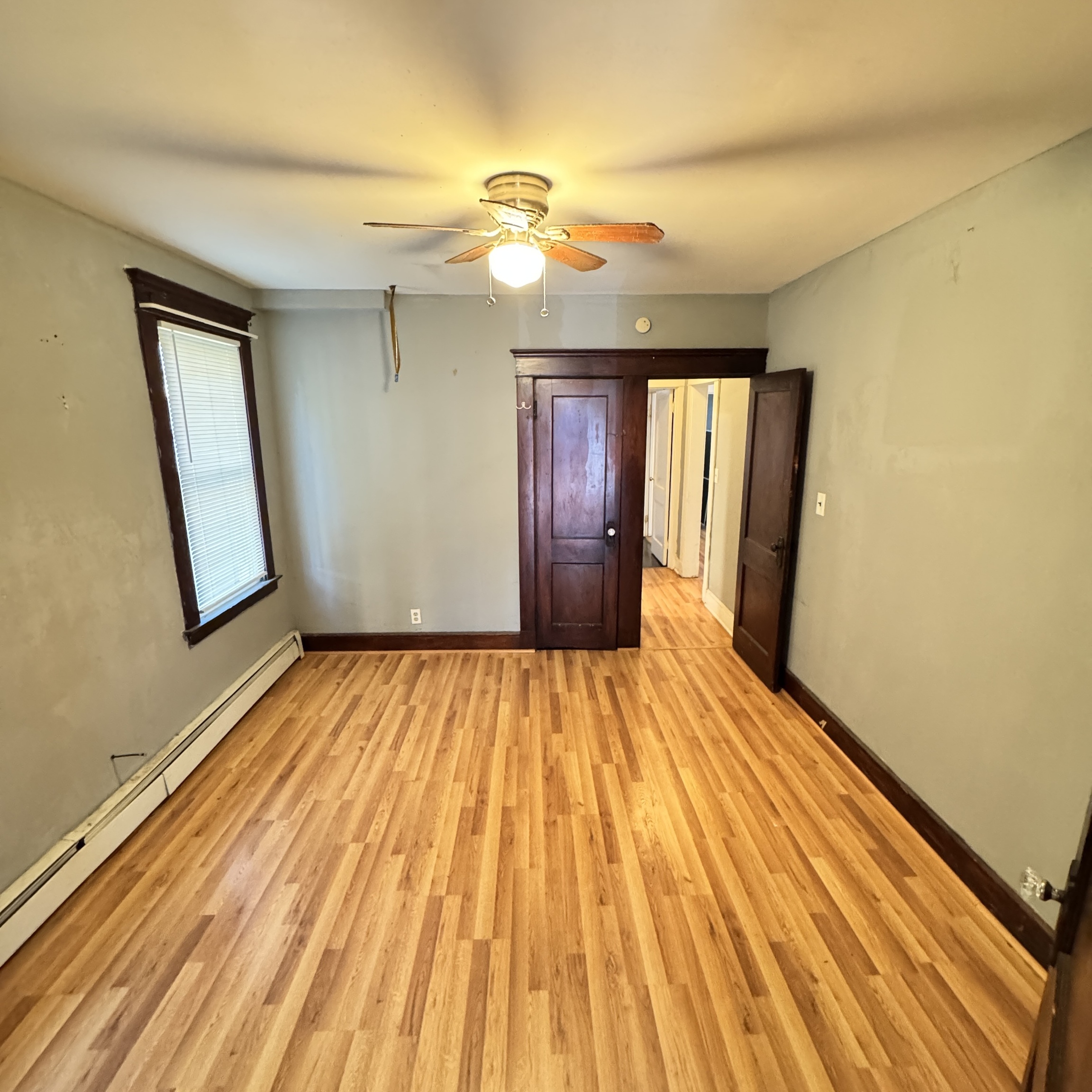 89 Beacon Street, Unit 1 Hamden, CT 06514 - Photo 3 of 11 a view of a room with wooden floor and staircase