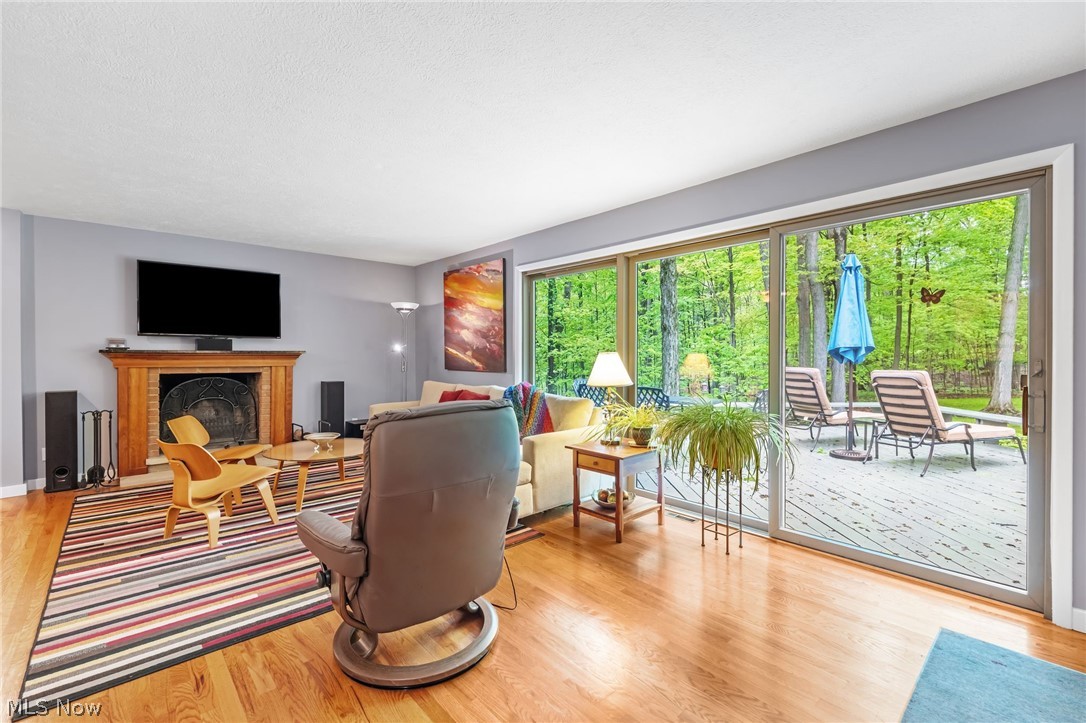 4587 Ranchwood Road Akron, OH 44333 - Photo 16 of 44 Living Room with floor-to-ceiling view of the outdoors