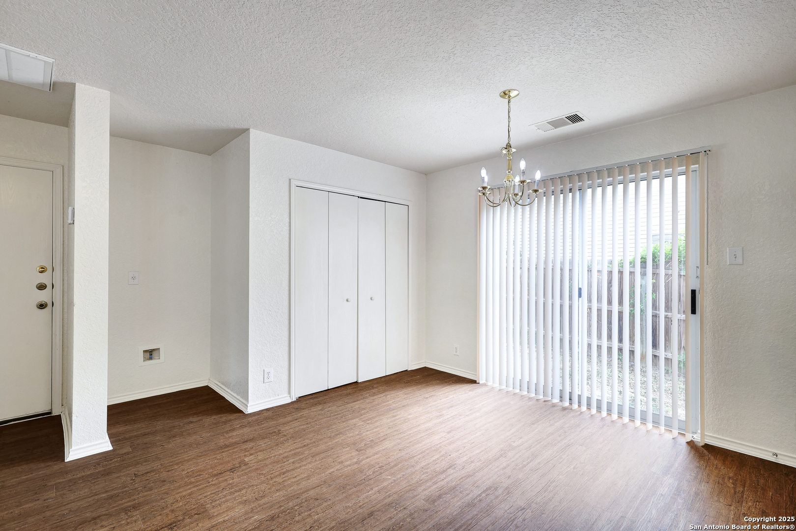 8014 Sandbar San Antonio, TX 78254 - Photo 12 of 30 an empty room with wooden floor and windows
