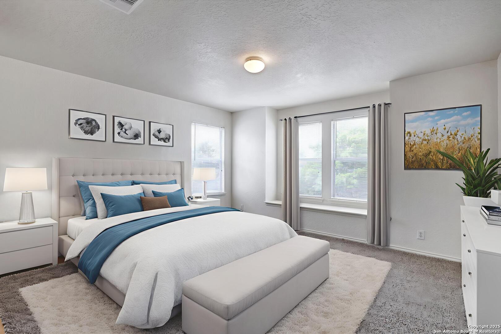 8014 Sandbar San Antonio, TX 78254 - Photo 15 of 30 a spacious bedroom with a large bed and a window