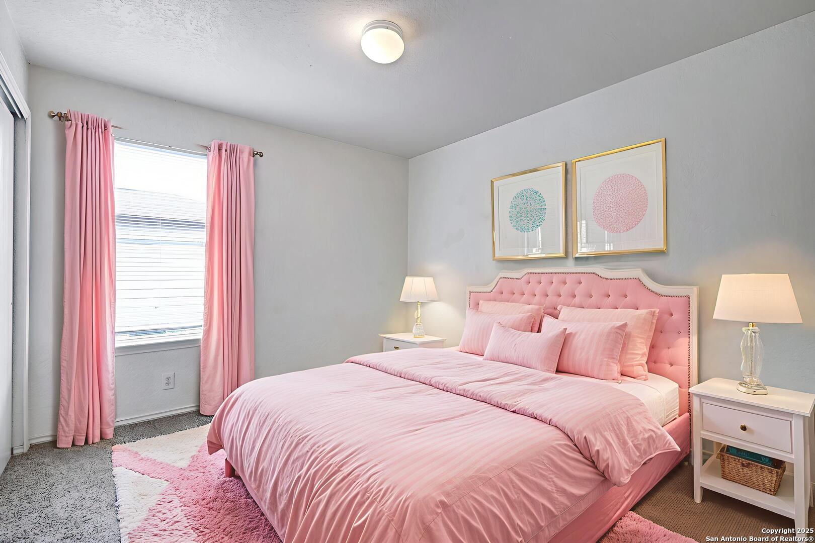 8014 Sandbar San Antonio, TX 78254 - Photo 20 of 30 a bedroom with a bed and a window