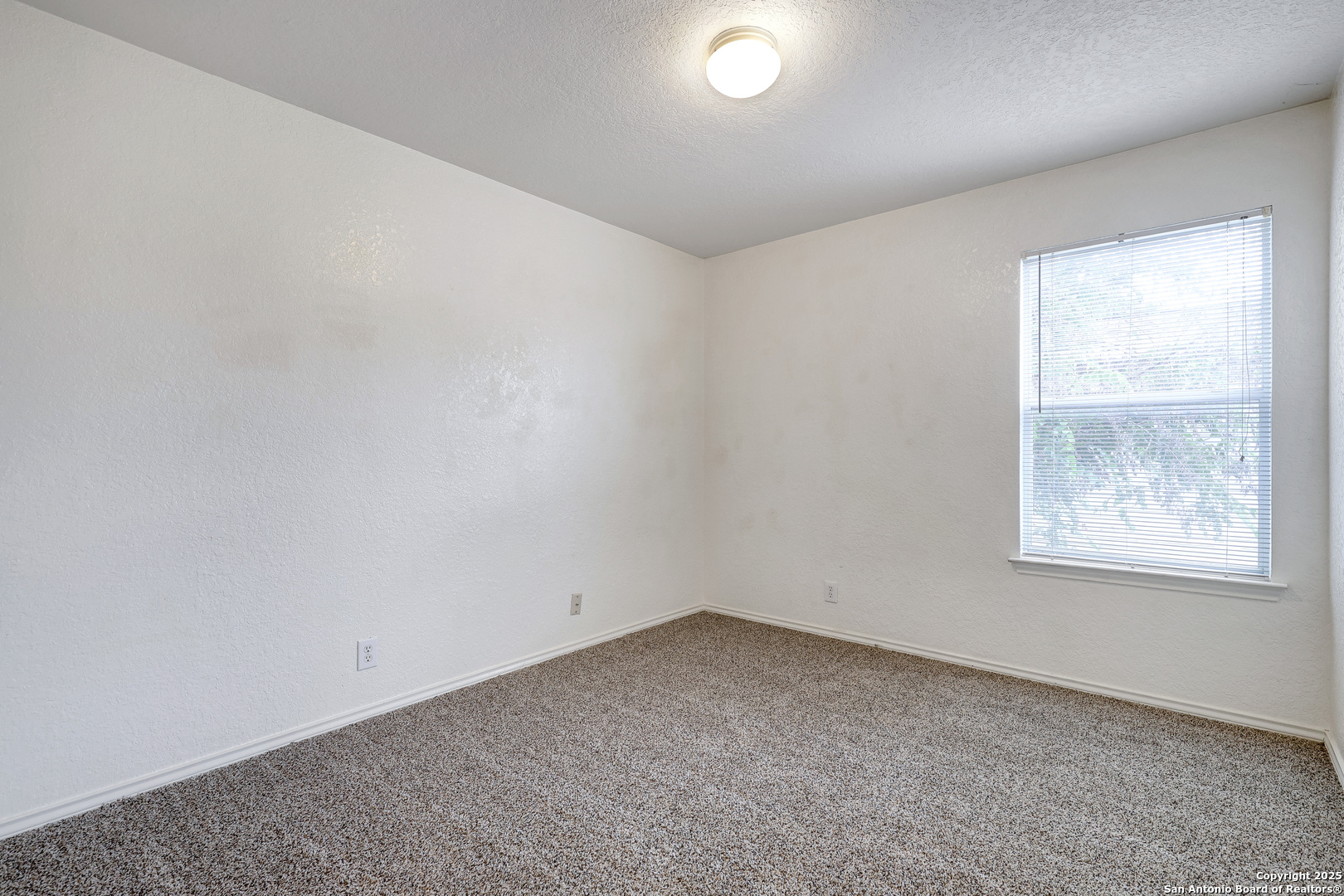 8014 Sandbar San Antonio, TX 78254 - Photo 25 of 30 an empty room with windows