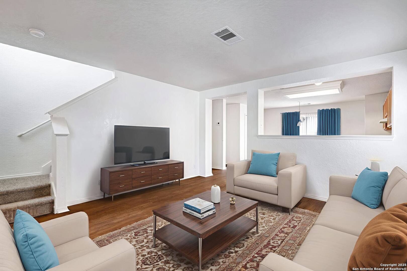 8014 Sandbar San Antonio, TX 78254 - Photo 4 of 30 a living room with furniture and a flat screen tv