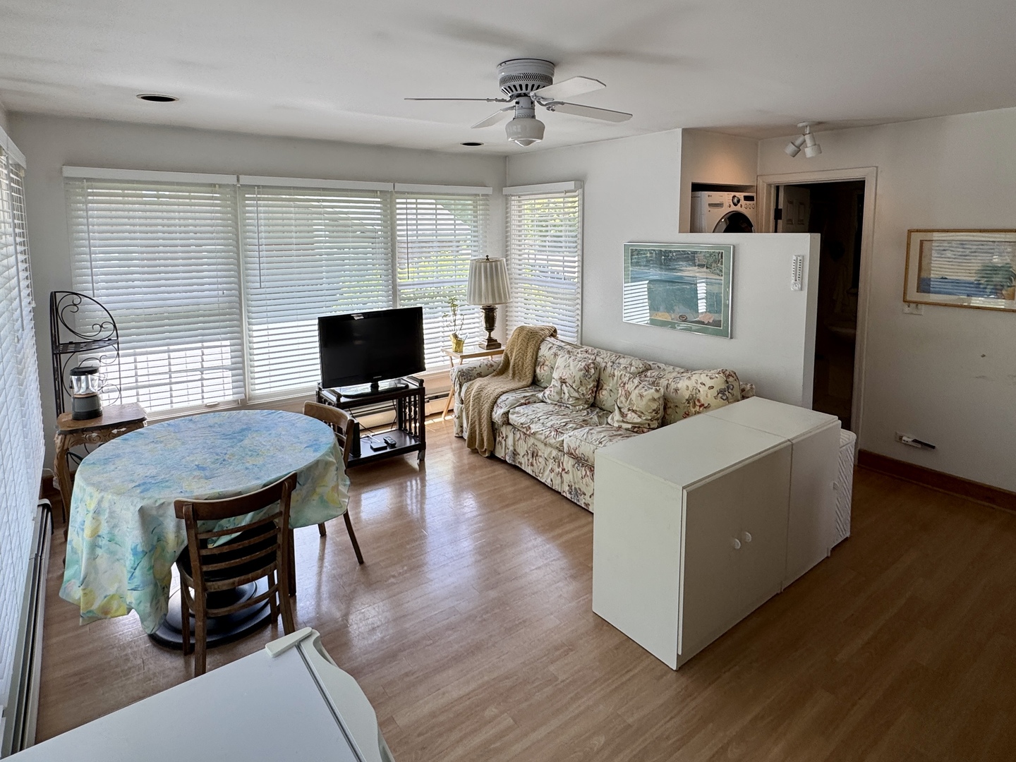 933 Harms Road Glenview, IL 60025 - Photo 11 of 25 a living room with furniture and a flat screen tv