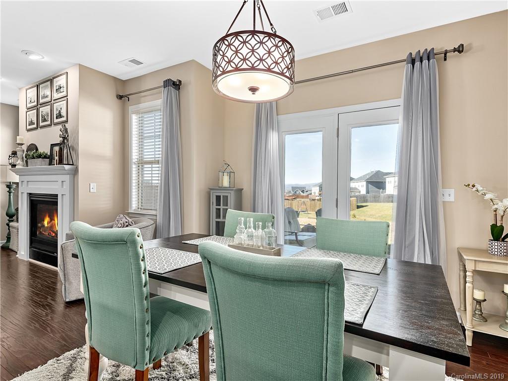 125 North River Road Fletcher, NC 28732 - Photo 5 of 18 a living room with furniture and a chandelier