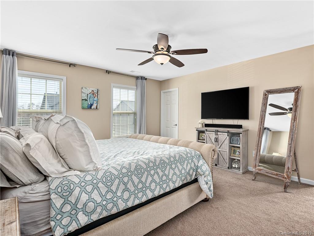 125 North River Road Fletcher, NC 28732 - Photo 10 of 18 a bedroom with bed tv and window