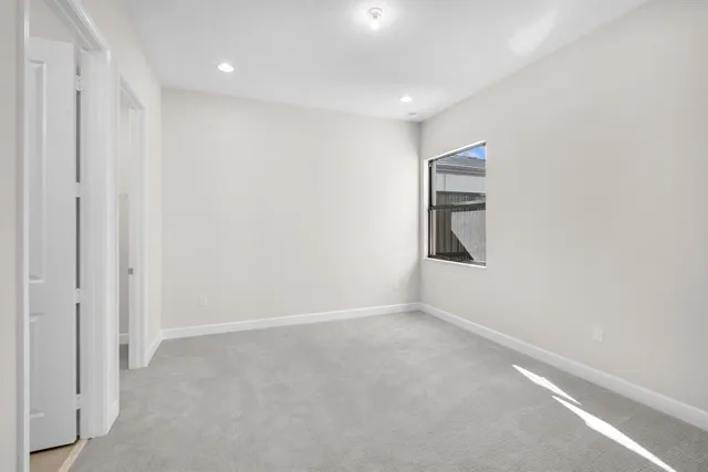 an empty room with closet