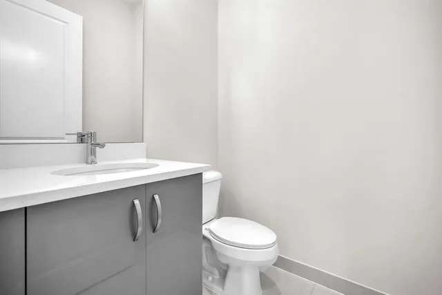 a view of a house with backyard porch and sitting area