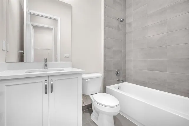 a view of a house with swimming pool and a yard