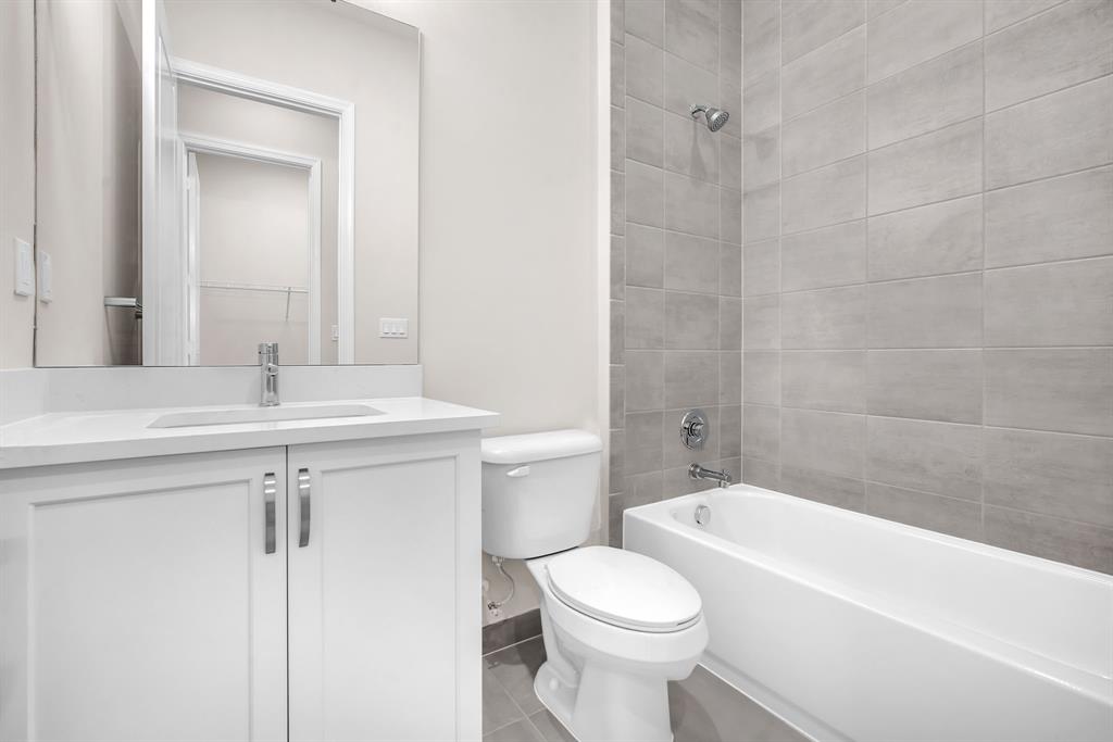 10990 Violet Mdw Street Boynton Beach, FL 33473 - Photo 24 of 60 a bathroom with a sink a toilet and shower