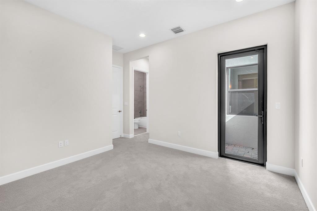 10990 Violet Mdw Street Boynton Beach, FL 33473 - Photo 25 of 60 an empty room with closet