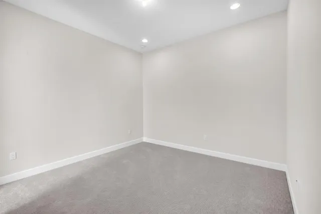 a view of a backyard of the house