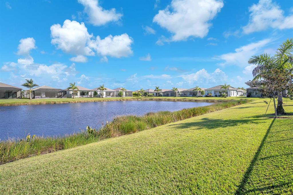 10990 Violet Mdw Street Boynton Beach, FL 33473 - Photo 49 of 60 a view of a city with lawn chairs