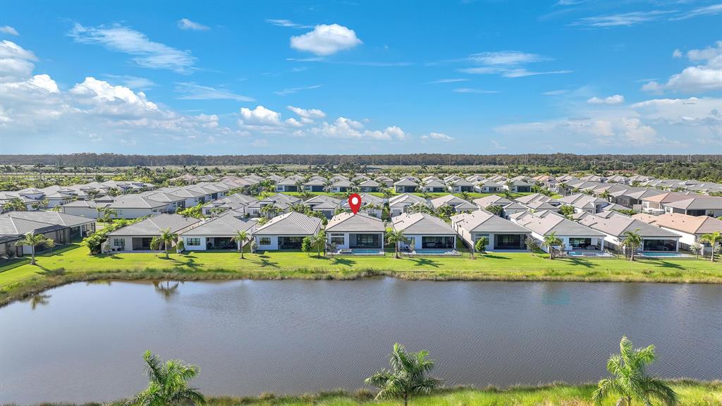 10990 Violet Mdw Street Boynton Beach, FL 33473 - Photo 50 of 60 a view of a lake with a city view