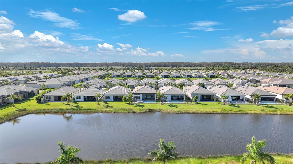 10990 Violet Mdw Street Boynton Beach, FL 33473 - Photo 51 of 60 a view of a lake with a city view