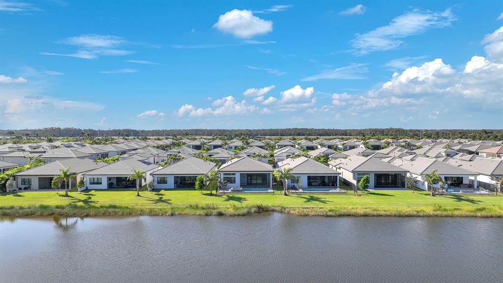 10990 Violet Mdw Street Boynton Beach, FL 33473 - Photo 59 of 60 a view of a city with tall buildings in the background