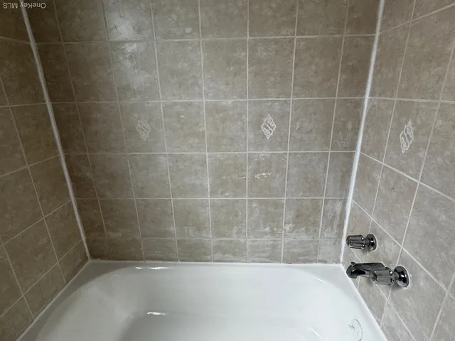 a bathroom with a bathtub