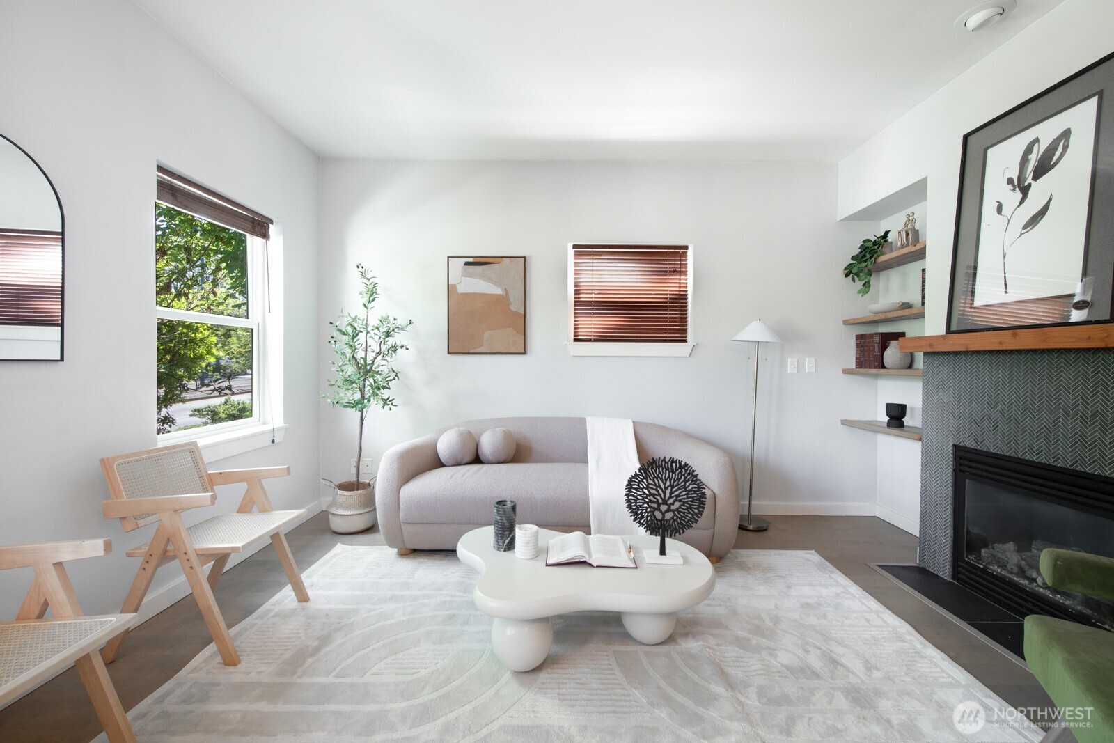 4121 Martin Luther King Jr Way South Seattle, WA 98108 - Photo 1 of 17 a living room with furniture a window and a fireplace