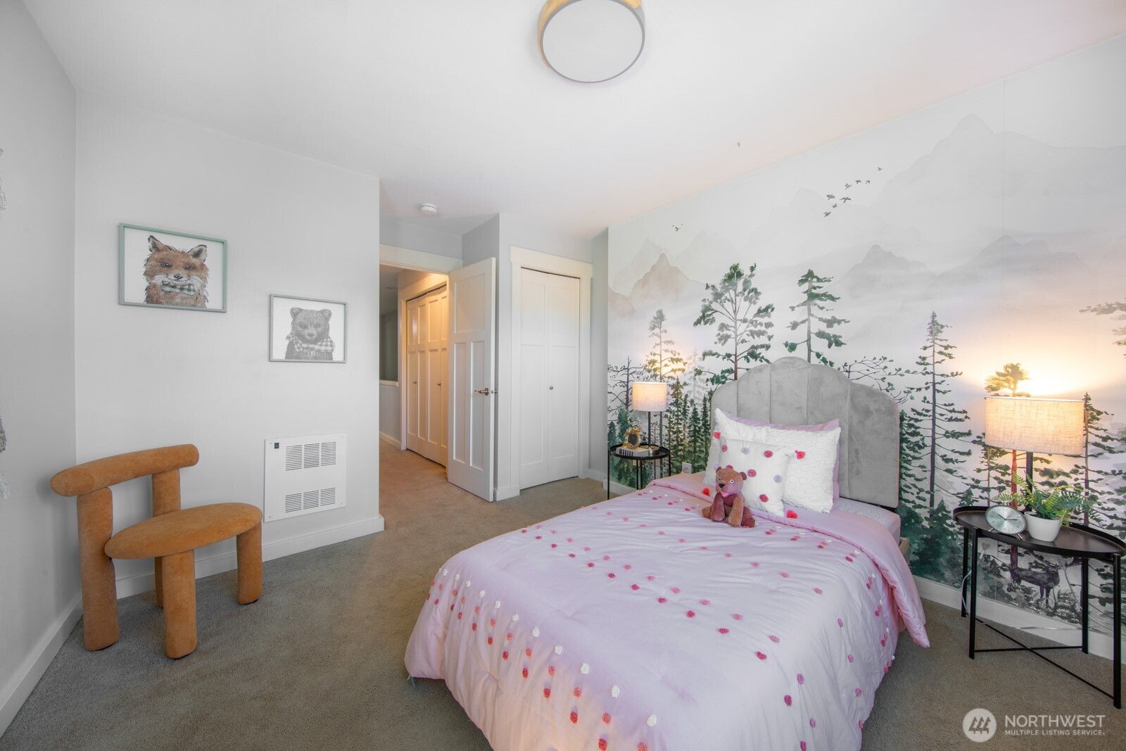 4121 Martin Luther King Jr Way South Seattle, WA 98108 - Photo 12 of 17 a bedroom with a bed and a chandelier