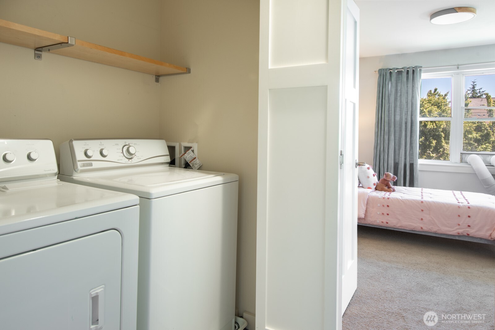 4121 Martin Luther King Jr Way South Seattle, WA 98108 - Photo 13 of 17 a utility room with dryer and washer