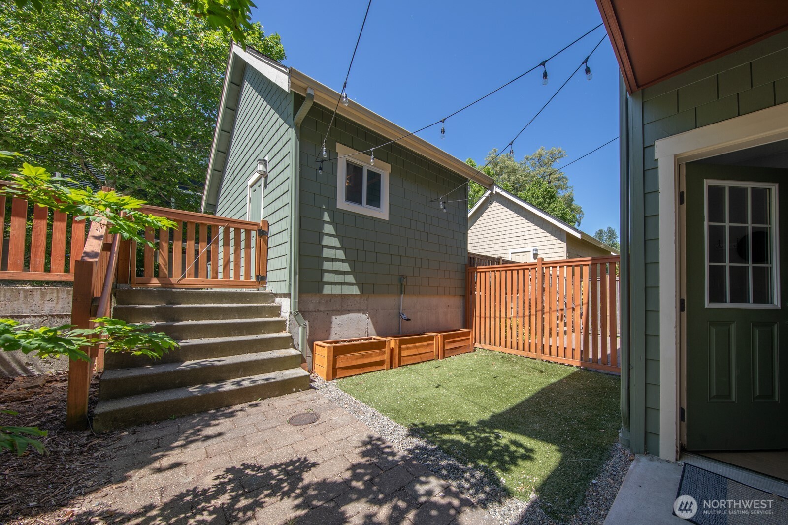 4121 Martin Luther King Jr Way South Seattle, WA 98108 - Photo 15 of 17 a backyard of a house with seating space