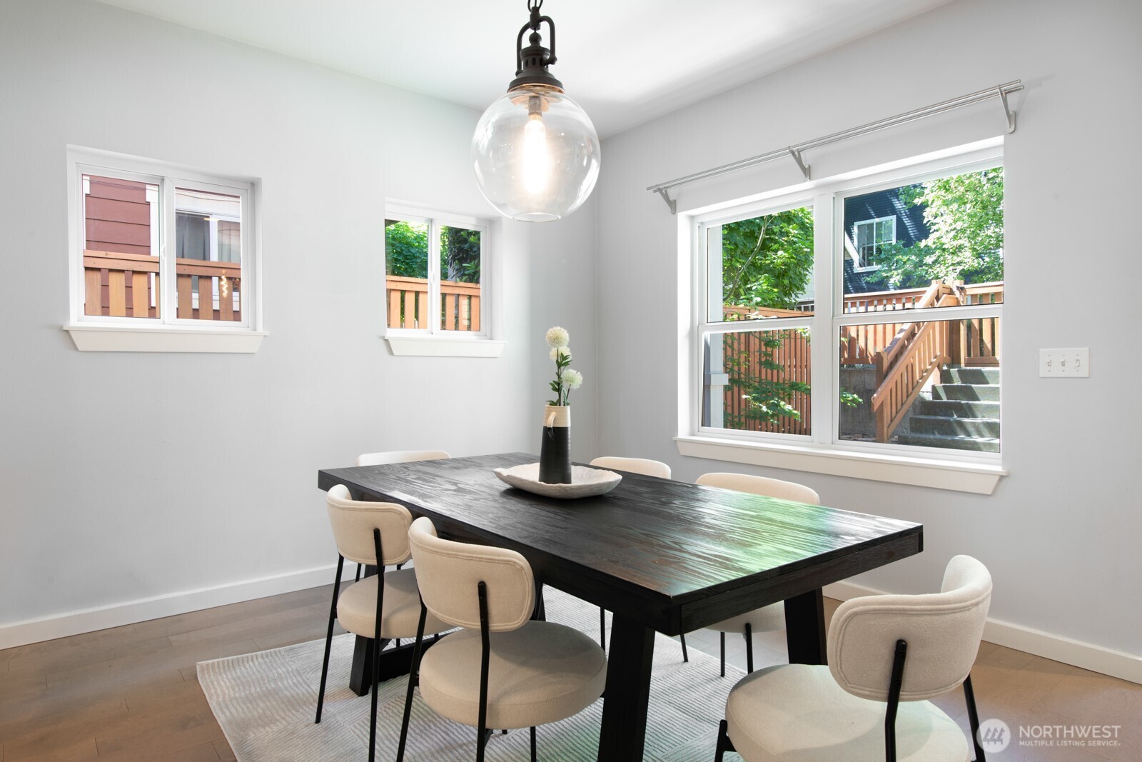 4121 Martin Luther King Jr Way South Seattle, WA 98108 - Photo 4 of 17 a view of a dining room with furniture window and wooden floor