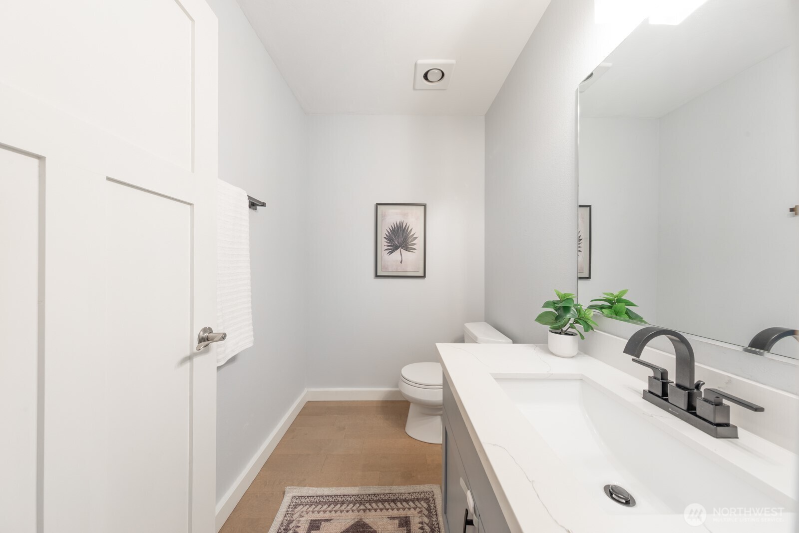 4121 Martin Luther King Jr Way South Seattle, WA 98108 - Photo 6 of 17 a bathroom with a sink and a mirror