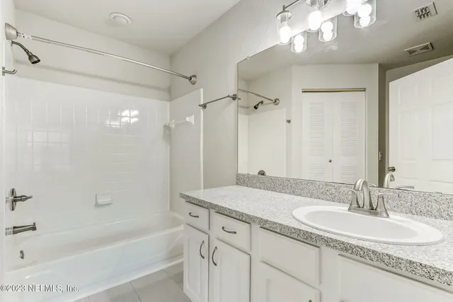 a bathroom with a bathtub