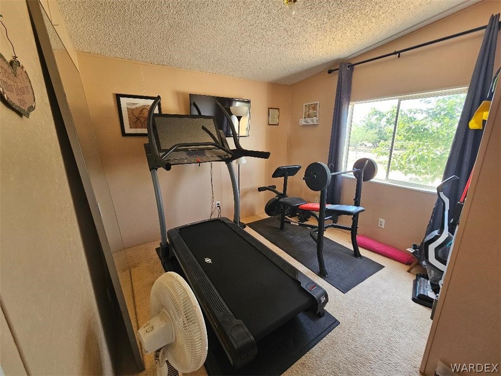 3552 Adobe Road Golden Valley, AZ 86413 - Photo 15 of 15 a room with furniture and wooden floor