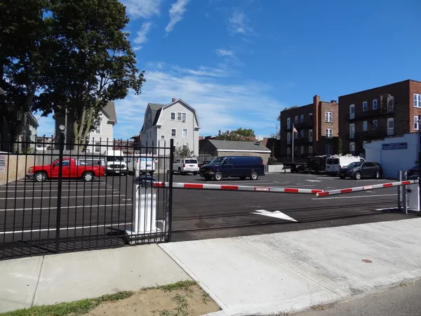 a view of street with parked cars