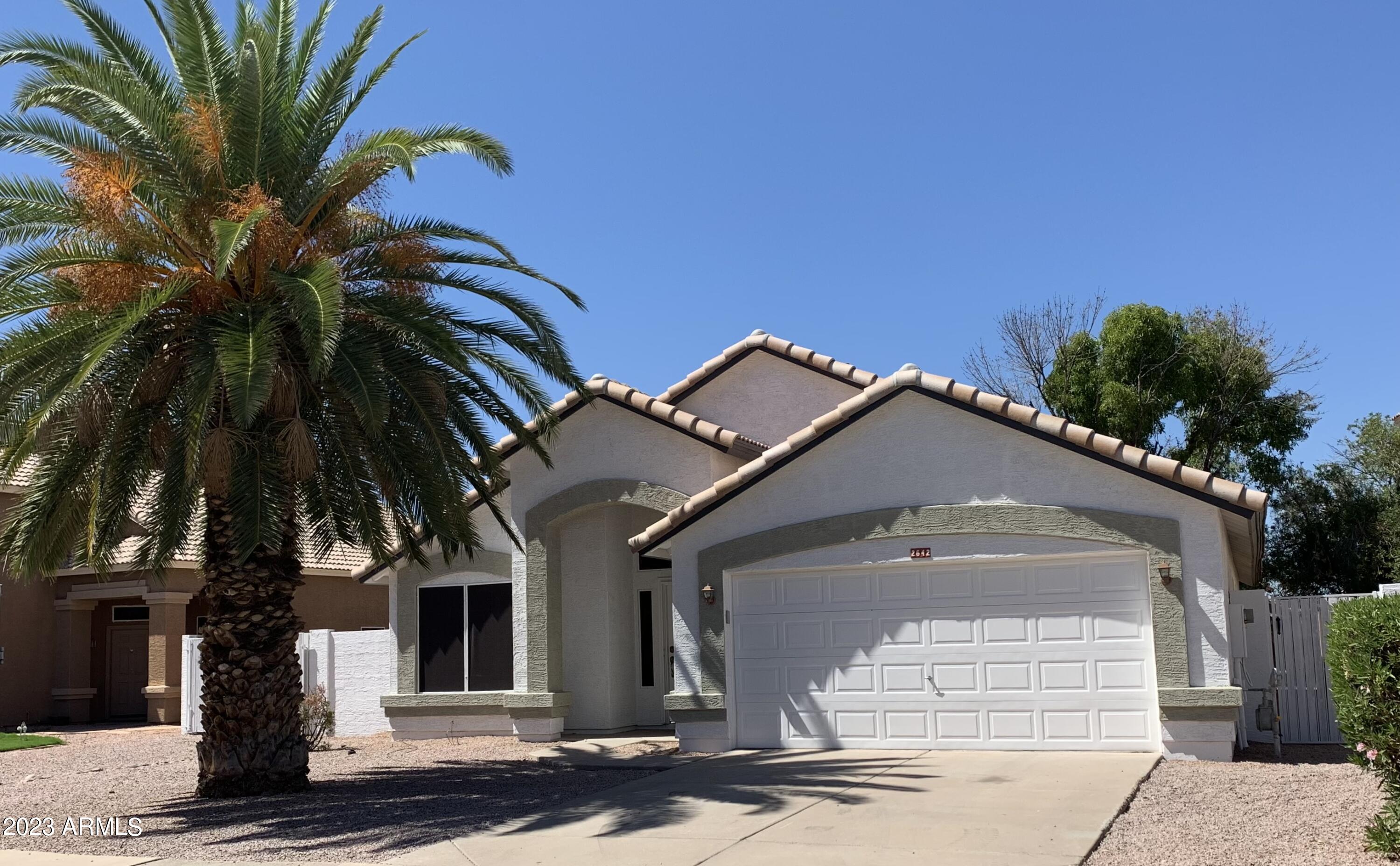 2642 South Augustine Mesa, AZ 85209 - Photo 1 of 18 a front view of a house with a yard