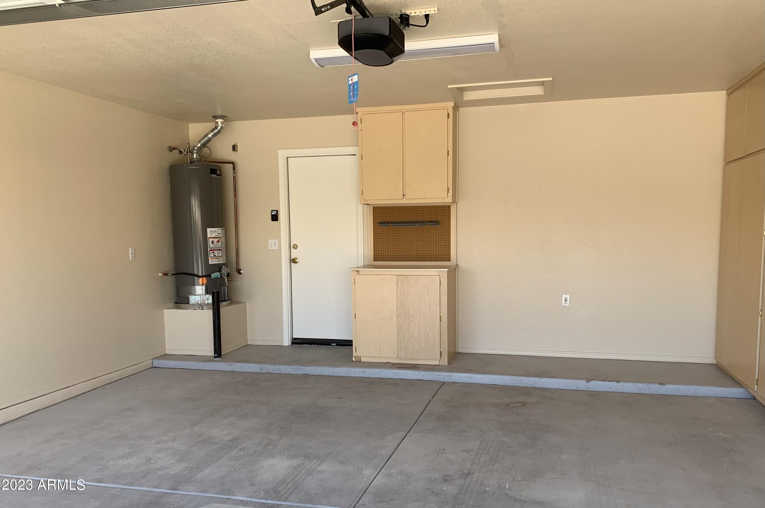 2642 South Augustine Mesa, AZ 85209 - Photo 14 of 18 an empty room with a kitchen view