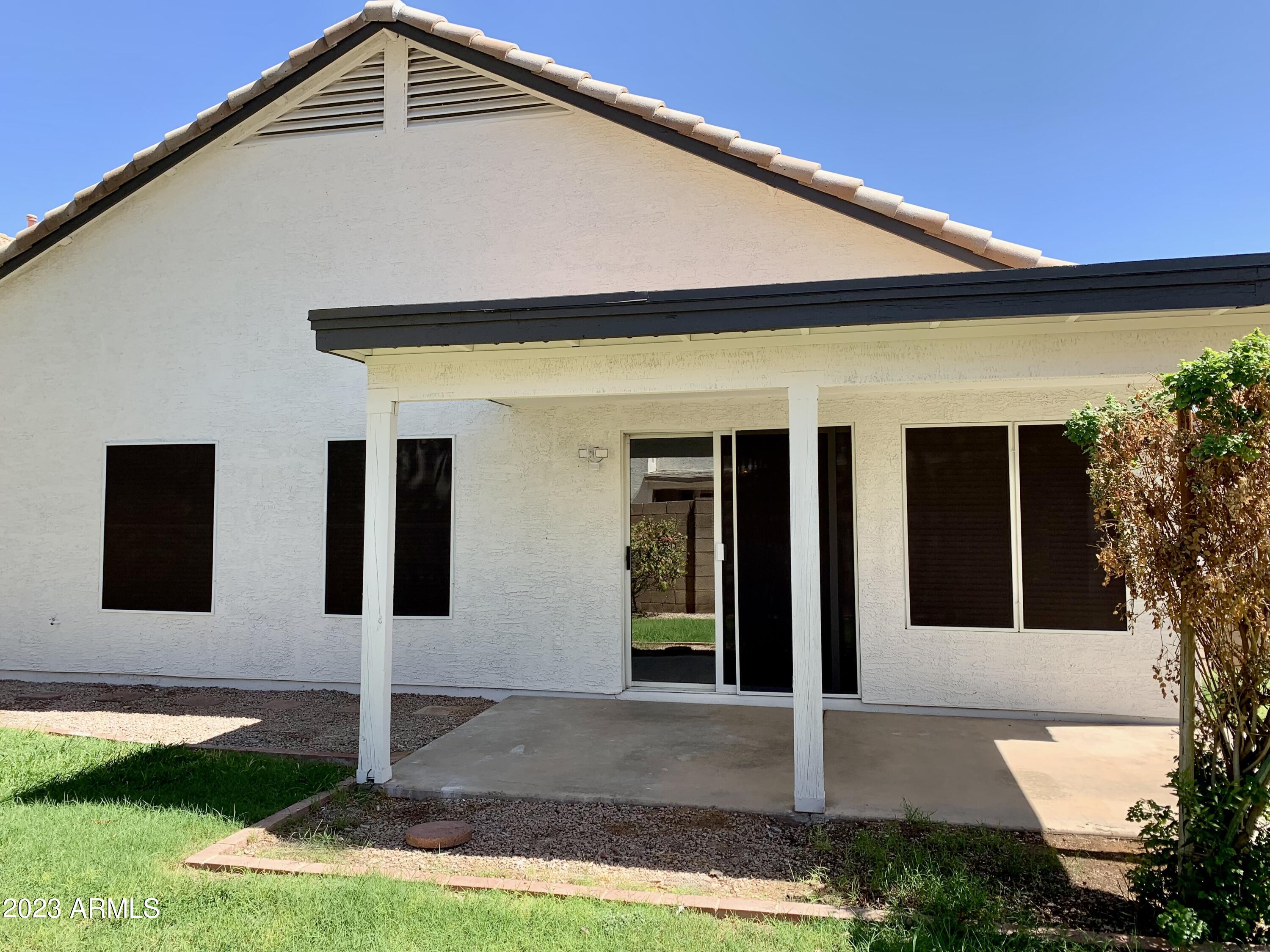 2642 South Augustine Mesa, AZ 85209 - Photo 16 of 18 a front view of a house with garden