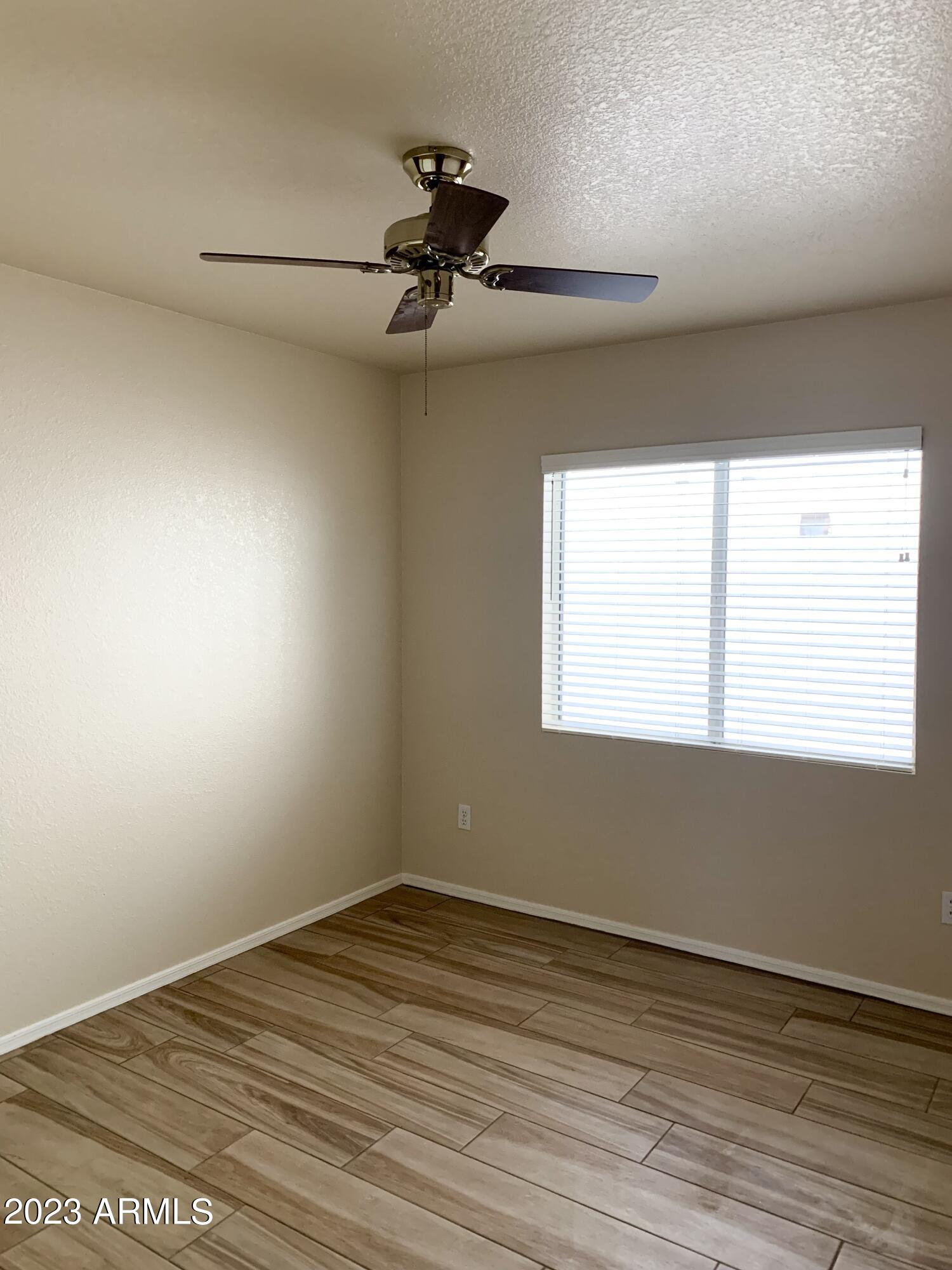 2642 South Augustine Mesa, AZ 85209 - Photo 9 of 18 an empty room with a window