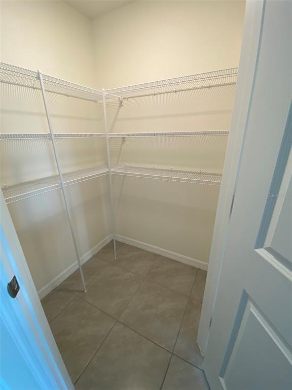 8864 Southwest 49th Circle Ocala, FL 34476 - Photo 18 of 48 a bathroom with a shower