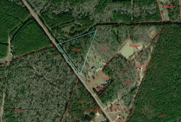 a view of a lake with a floor to ceiling window