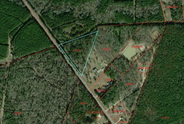 a view of a lake with a floor to ceiling window