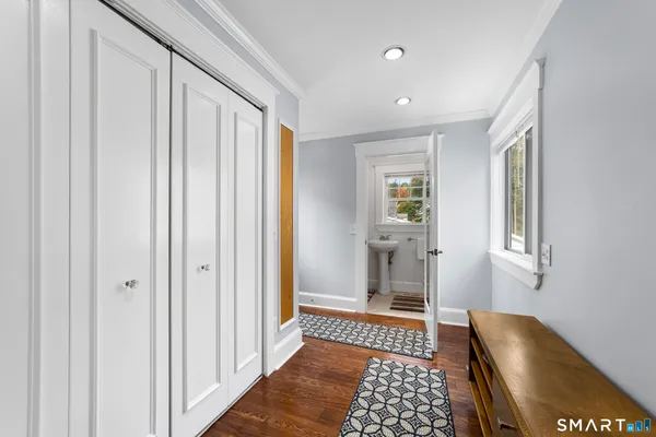 a view of bedroom with furniture and window