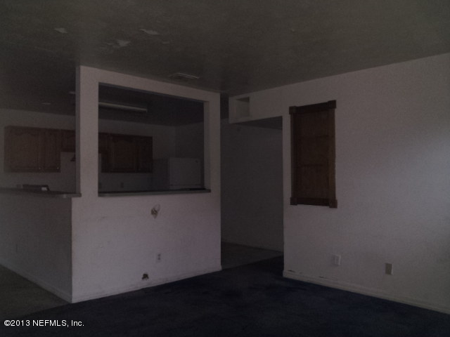 720 Bonita Road Atlantic Beach, FL 32233 - Photo 6 of 12 a view of hallway with stairs