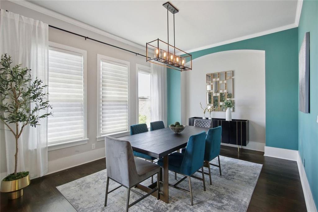 692 Drewry Street Northeast Atlanta, GA 30306 - Photo 6 of 25 a view of a dining room with furniture window and wooden floor