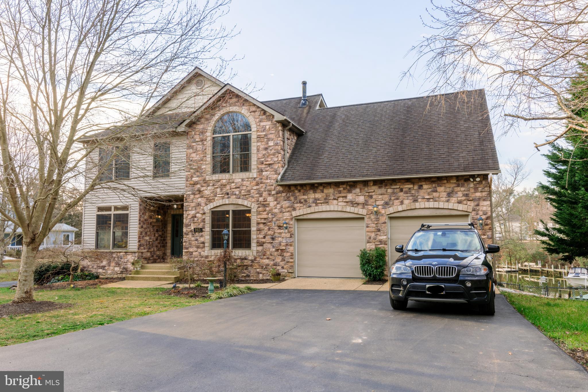 a car parked in front of a house