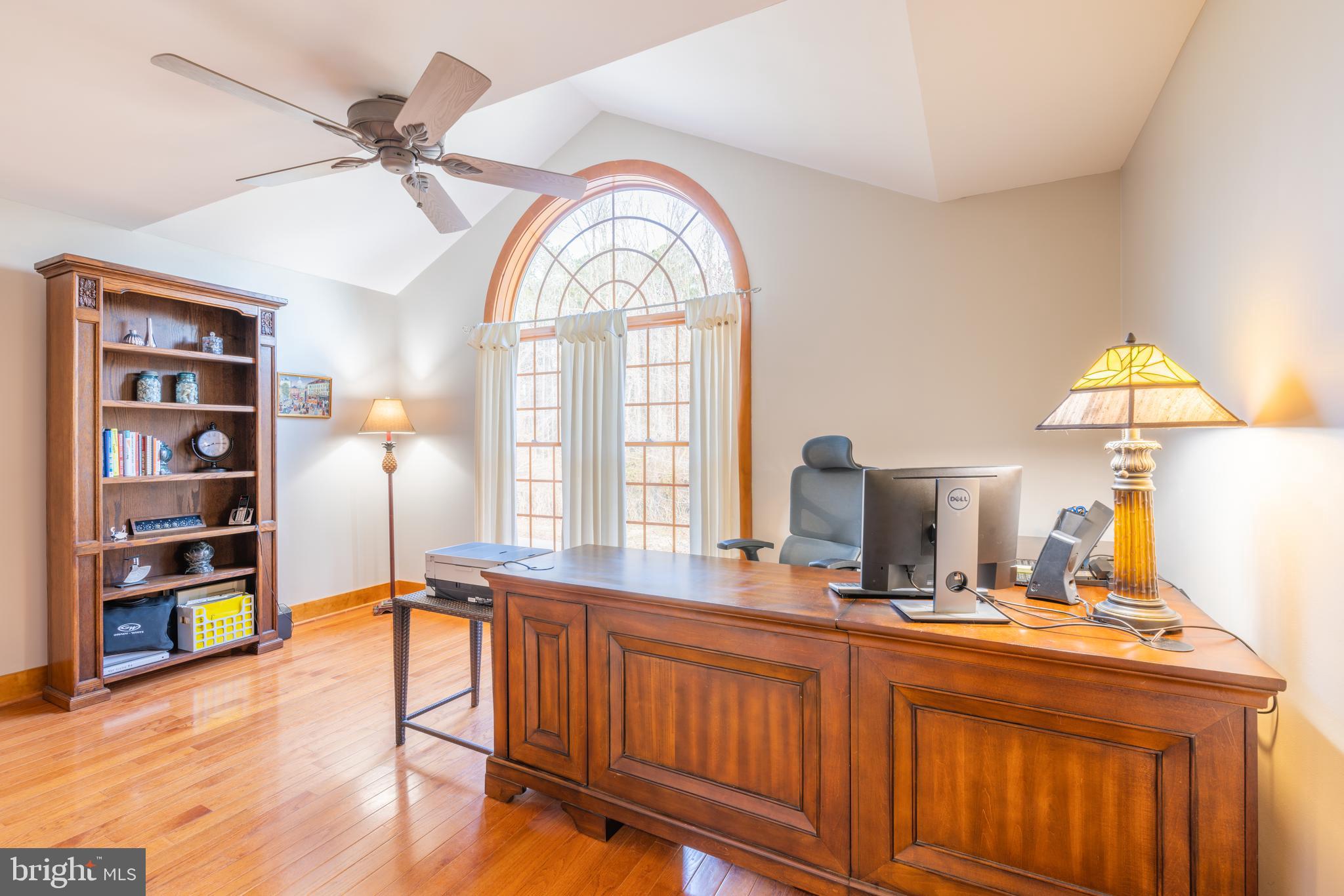965 Curtis Road Solomons, MD 20629 - Photo 24 of 47 a very nice looking room with a large window and a wooden floor