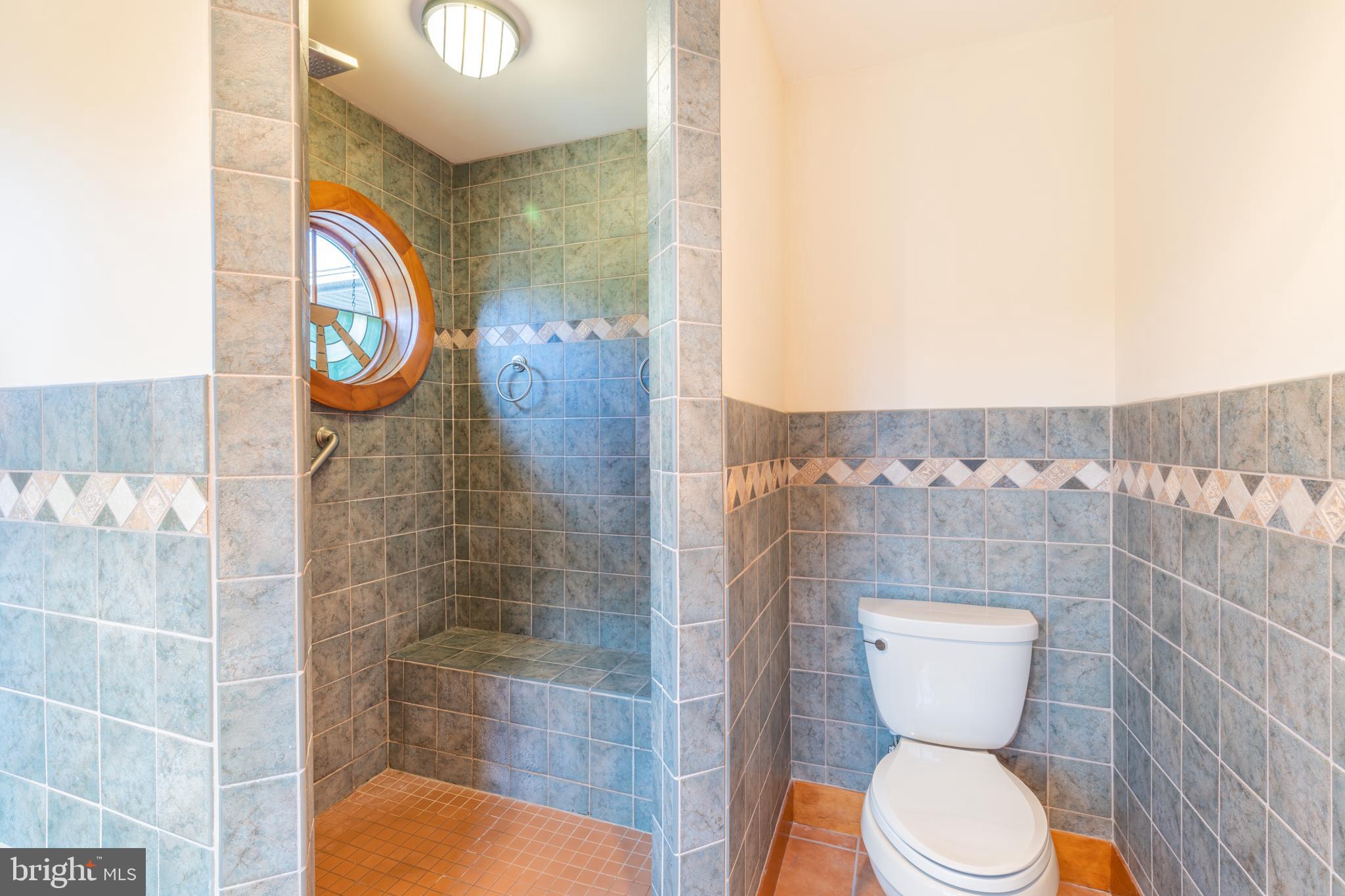 965 Curtis Road Solomons, MD 20629 - Photo 38 of 47 a bathroom with a toilet and a shower