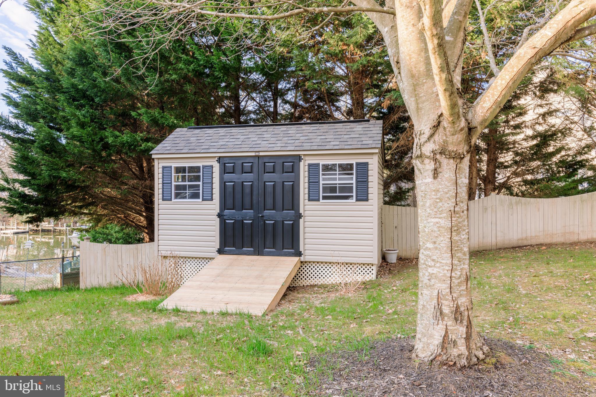 965 Curtis Road Solomons, MD 20629 - Photo 5 of 47 a view of a house with a yard