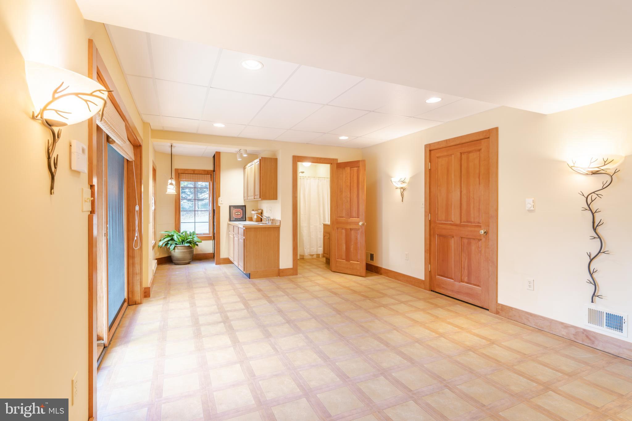 965 Curtis Road Solomons, MD 20629 - Photo 43 of 47 a view of an empty room with a window
