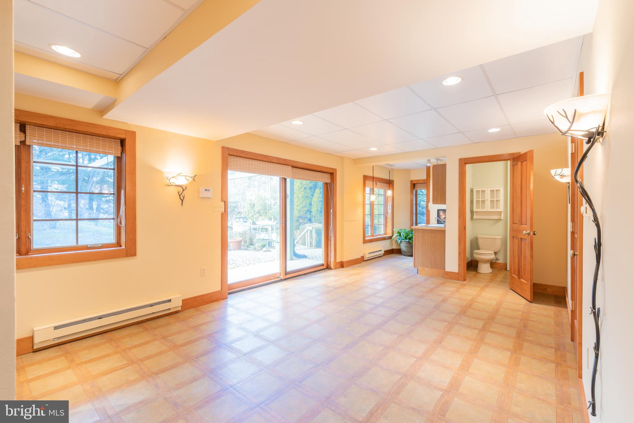 965 Curtis Road Solomons, MD 20629 - Photo 45 of 47 a view of an empty room with a window