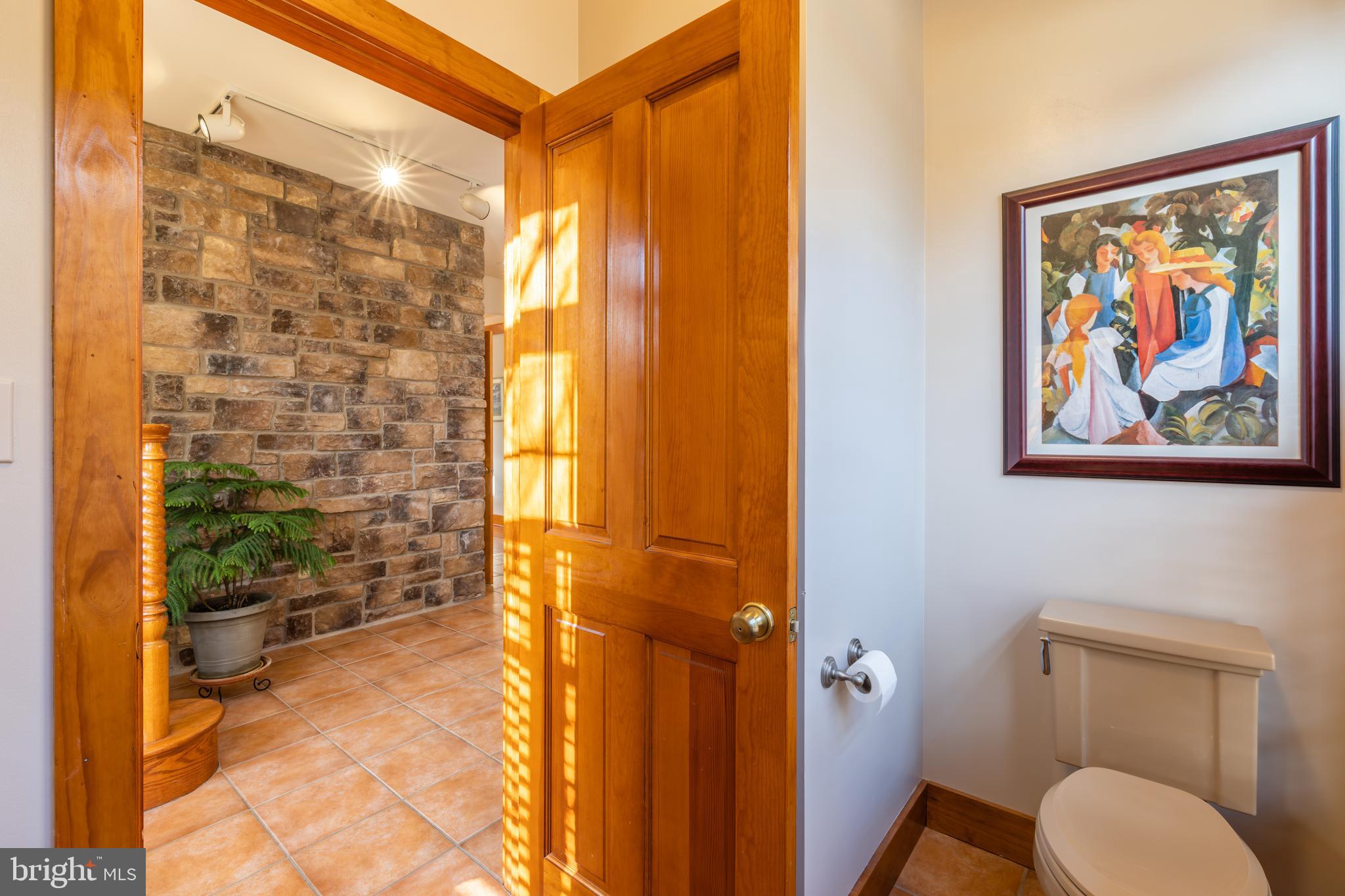 965 Curtis Road Solomons, MD 20629 - Photo 8 of 47 a bathroom with a toilet a sink and a shower