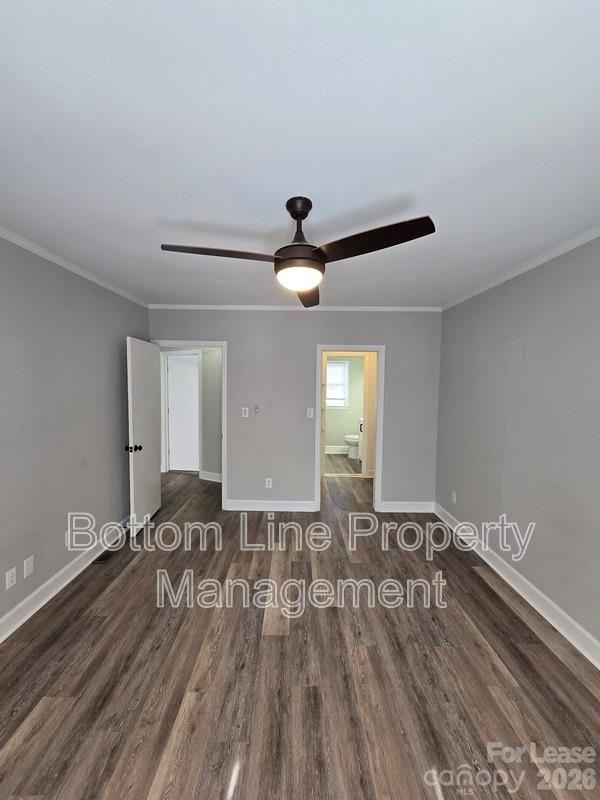 5949 Quail Hollow Road, Unit D Charlotte, NC 28210 - Photo 26 of 34 a view of empty room with wooden floor