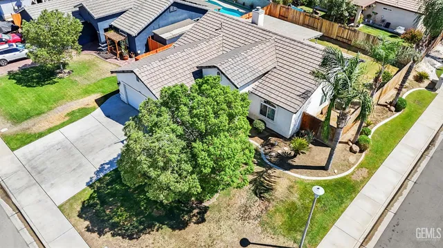 a aerial view of a house with garden